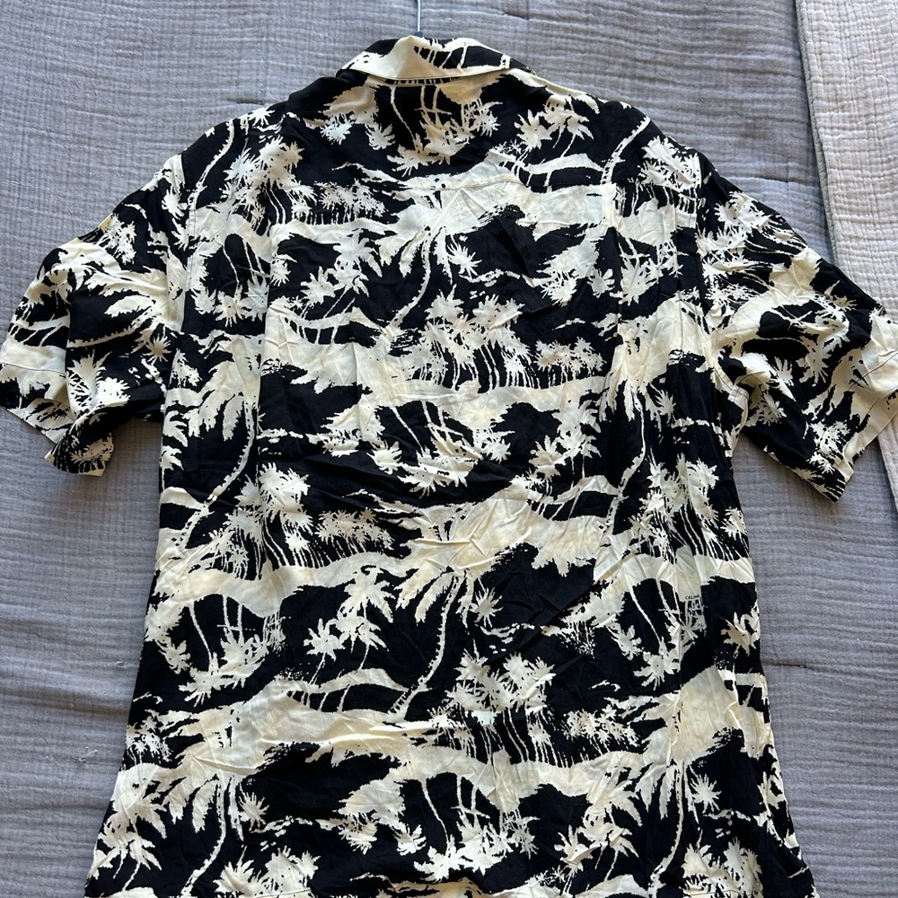 Like new men’s Celine patterned button down shirt.